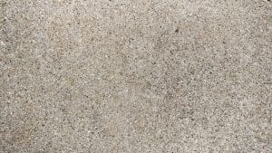 Comment refaire un revêtement en béton usé ?